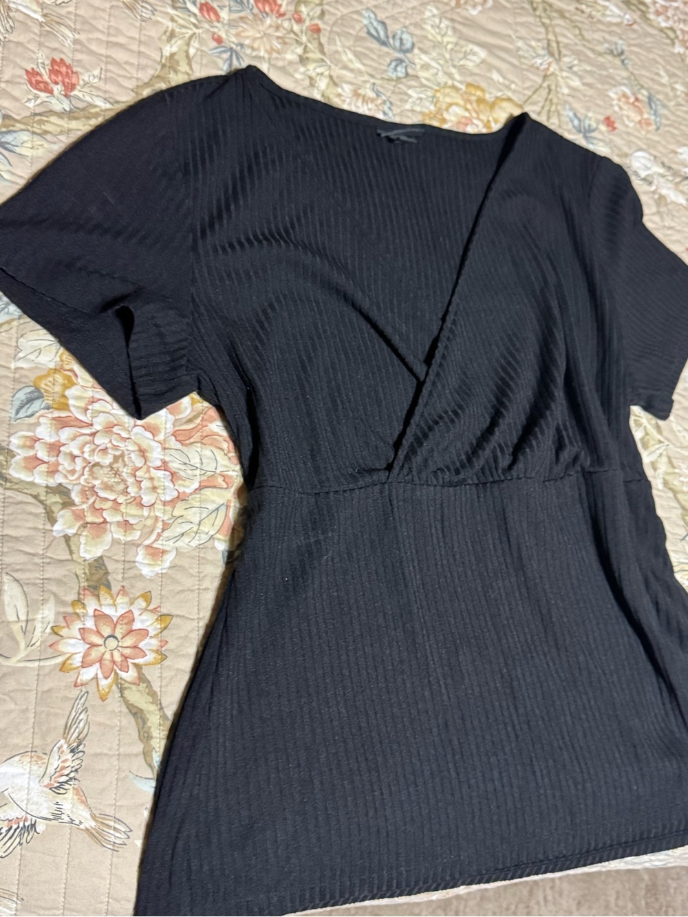 NWOT. Torrid black surplice top. Size 1